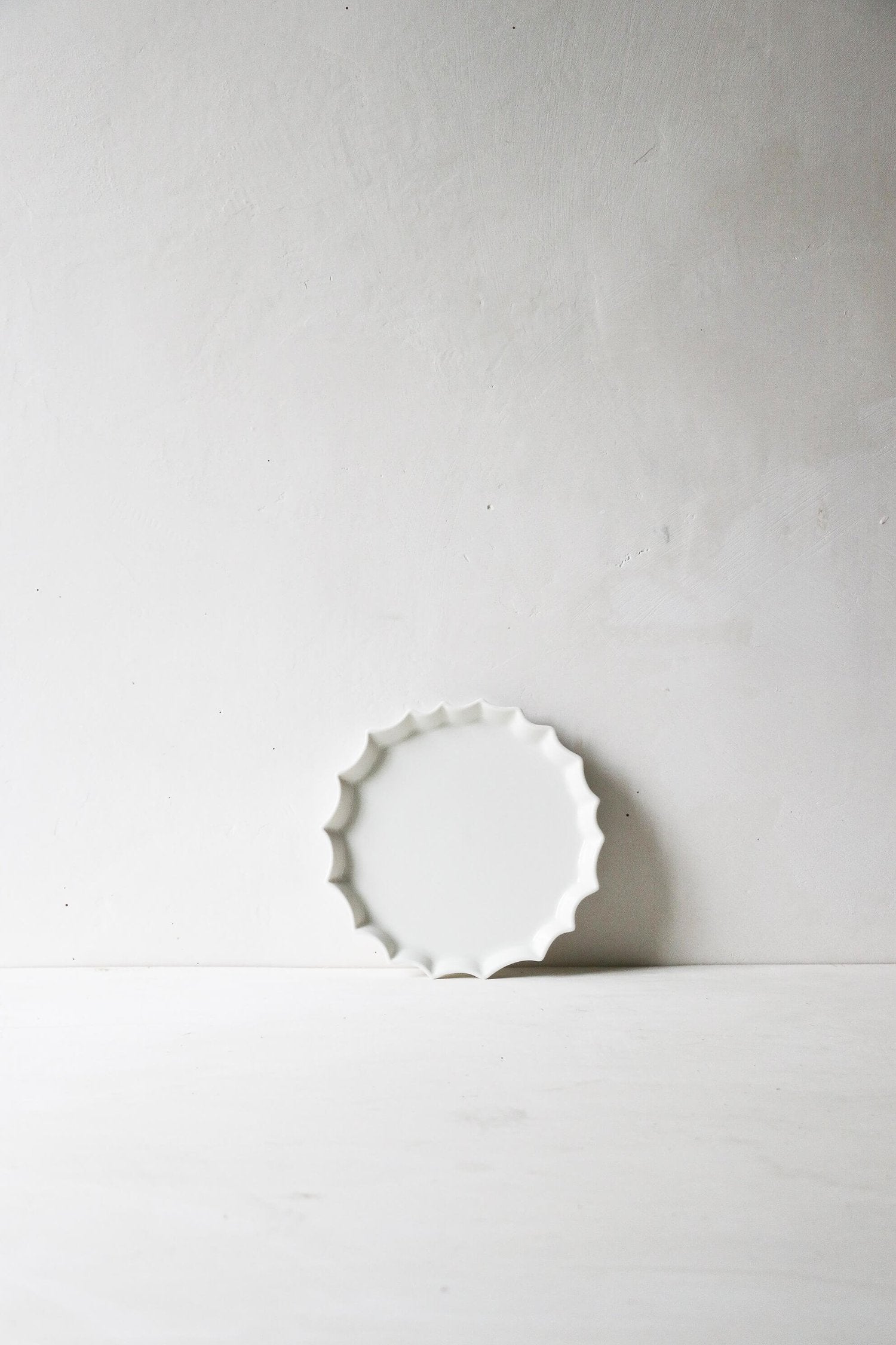 Assiette en porcelaine Canelé