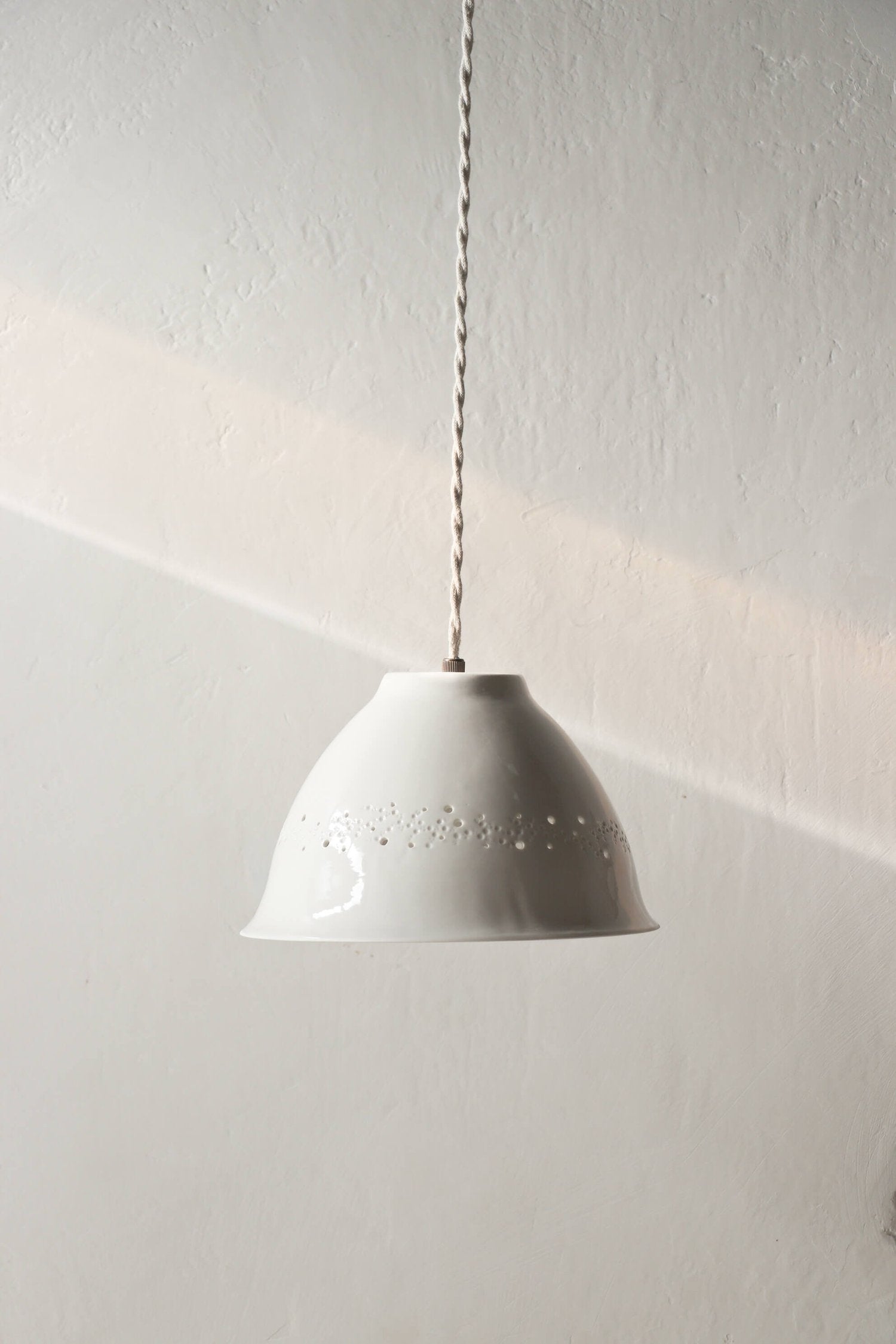 Baladeuse en porcelaine Point
