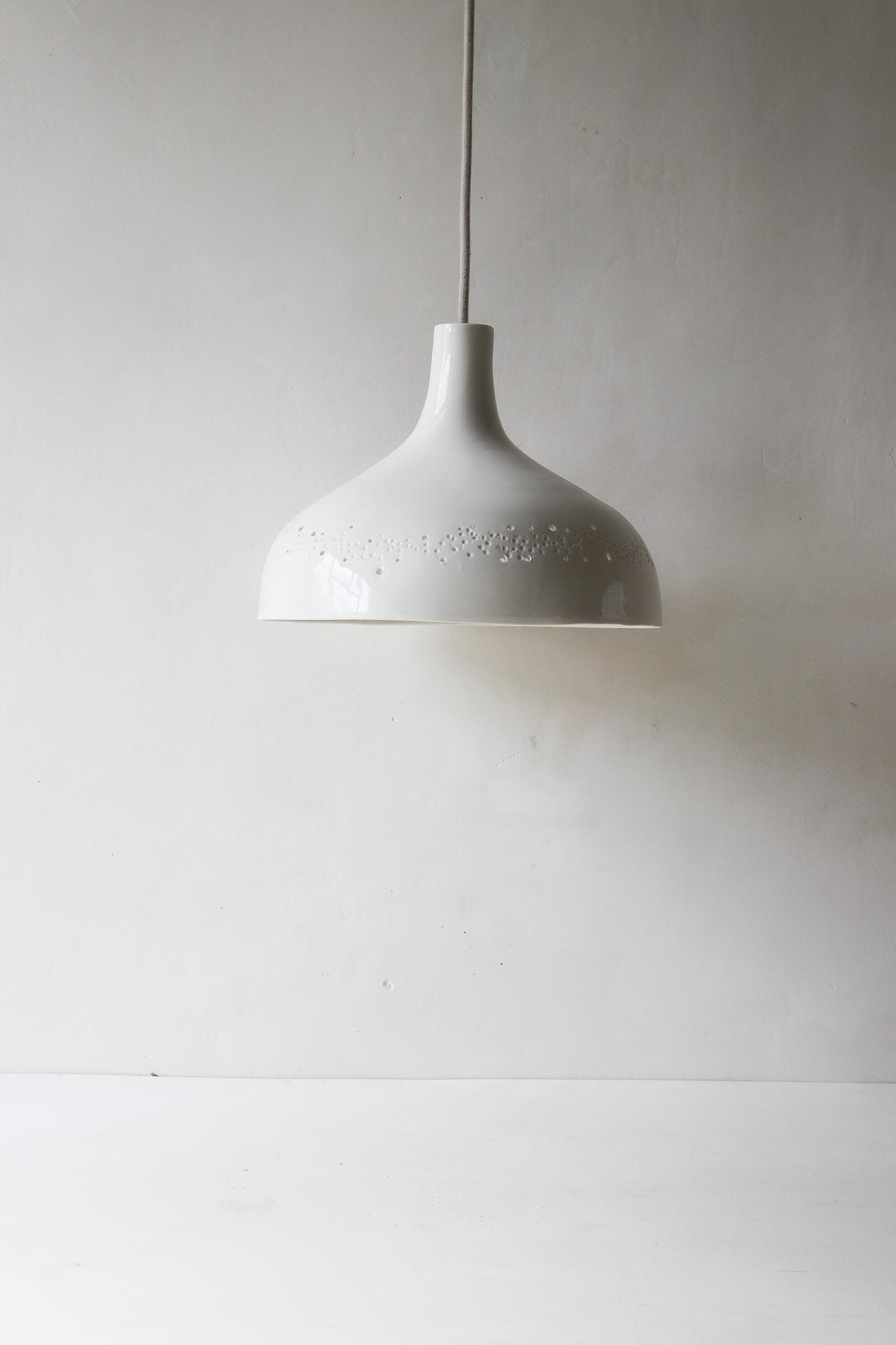 Suspension en porcelaine Point