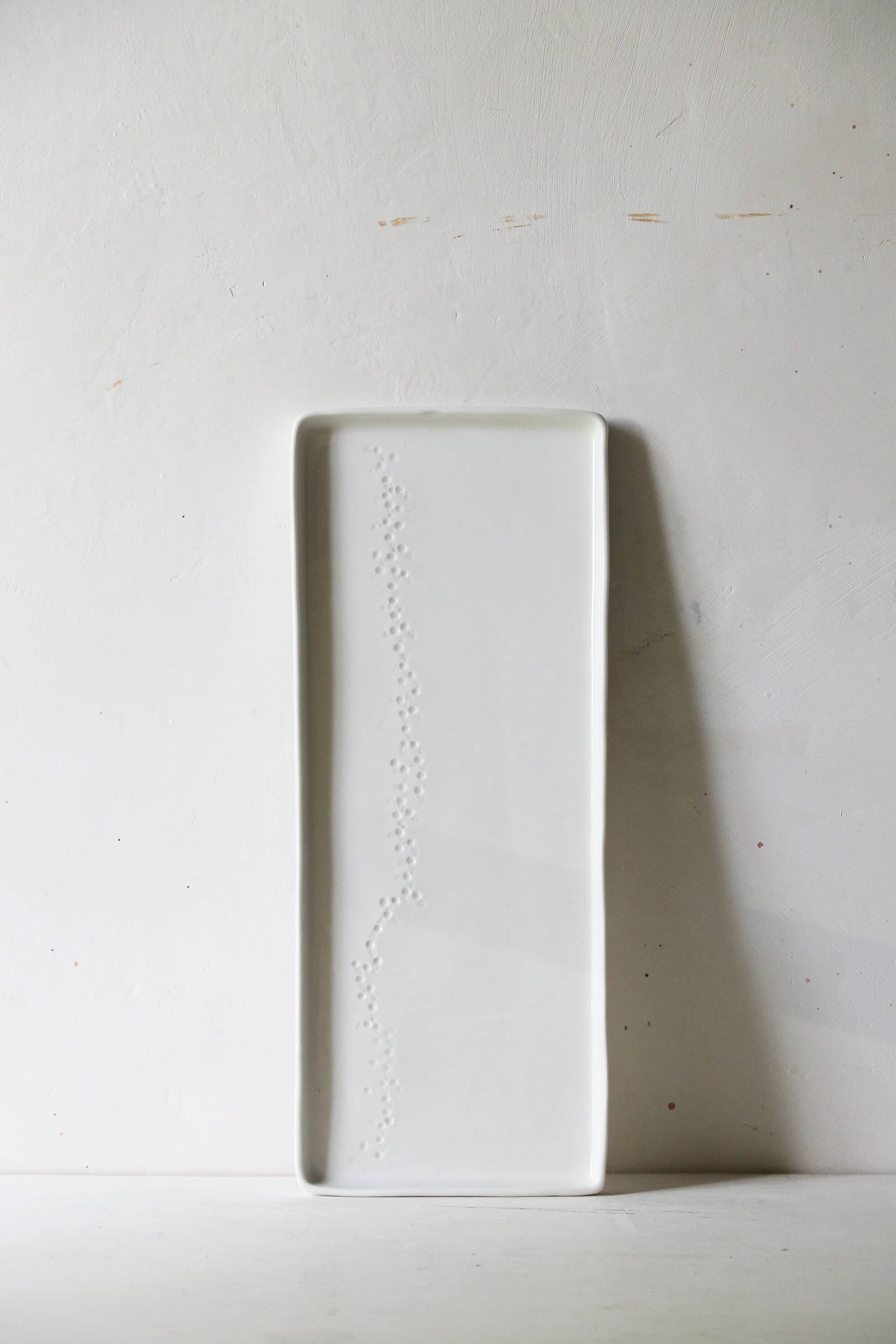 Plat à cake en porcelaine Point