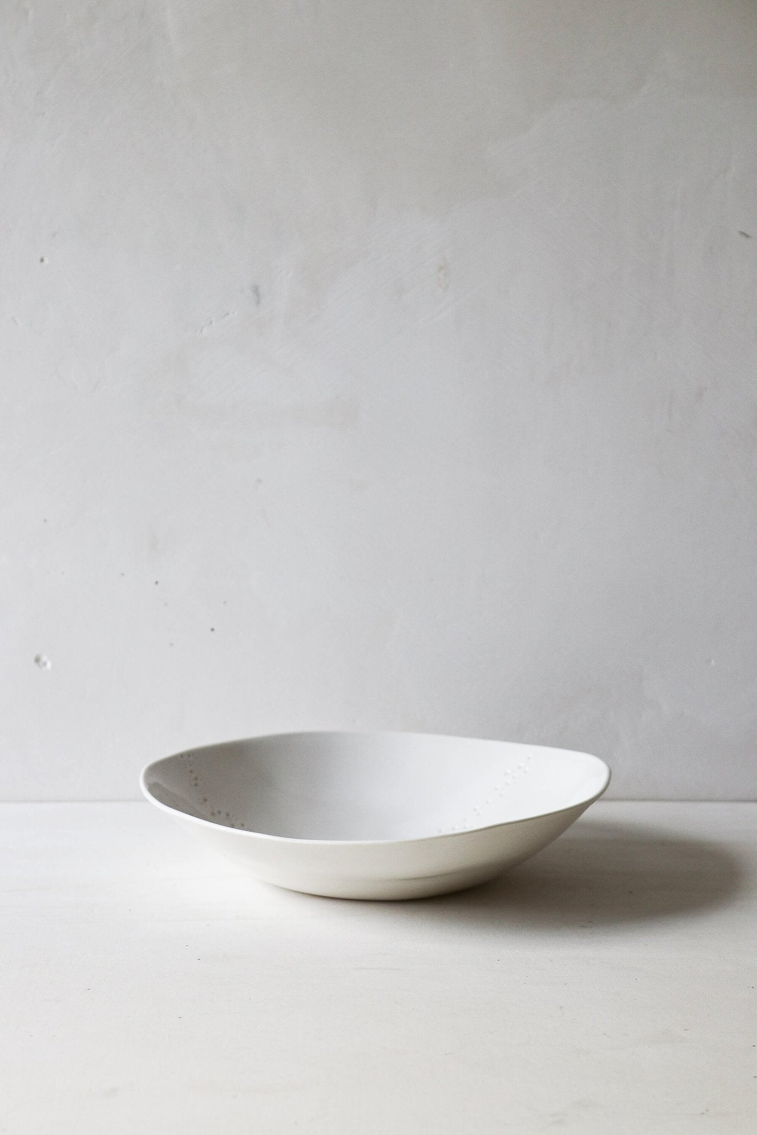 Assiette creuse en porcelaine Point