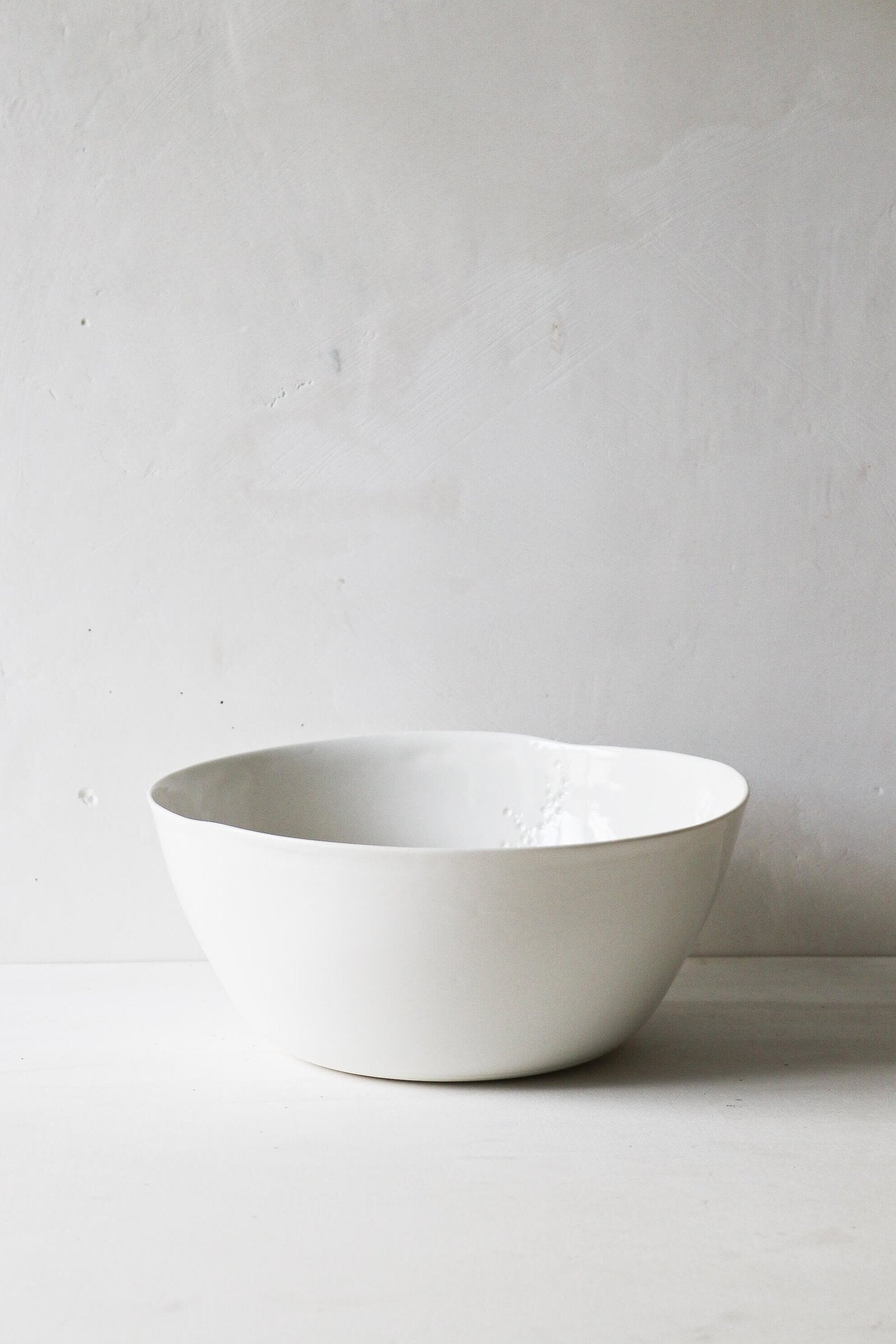 Saladier rond en porcelaine Point