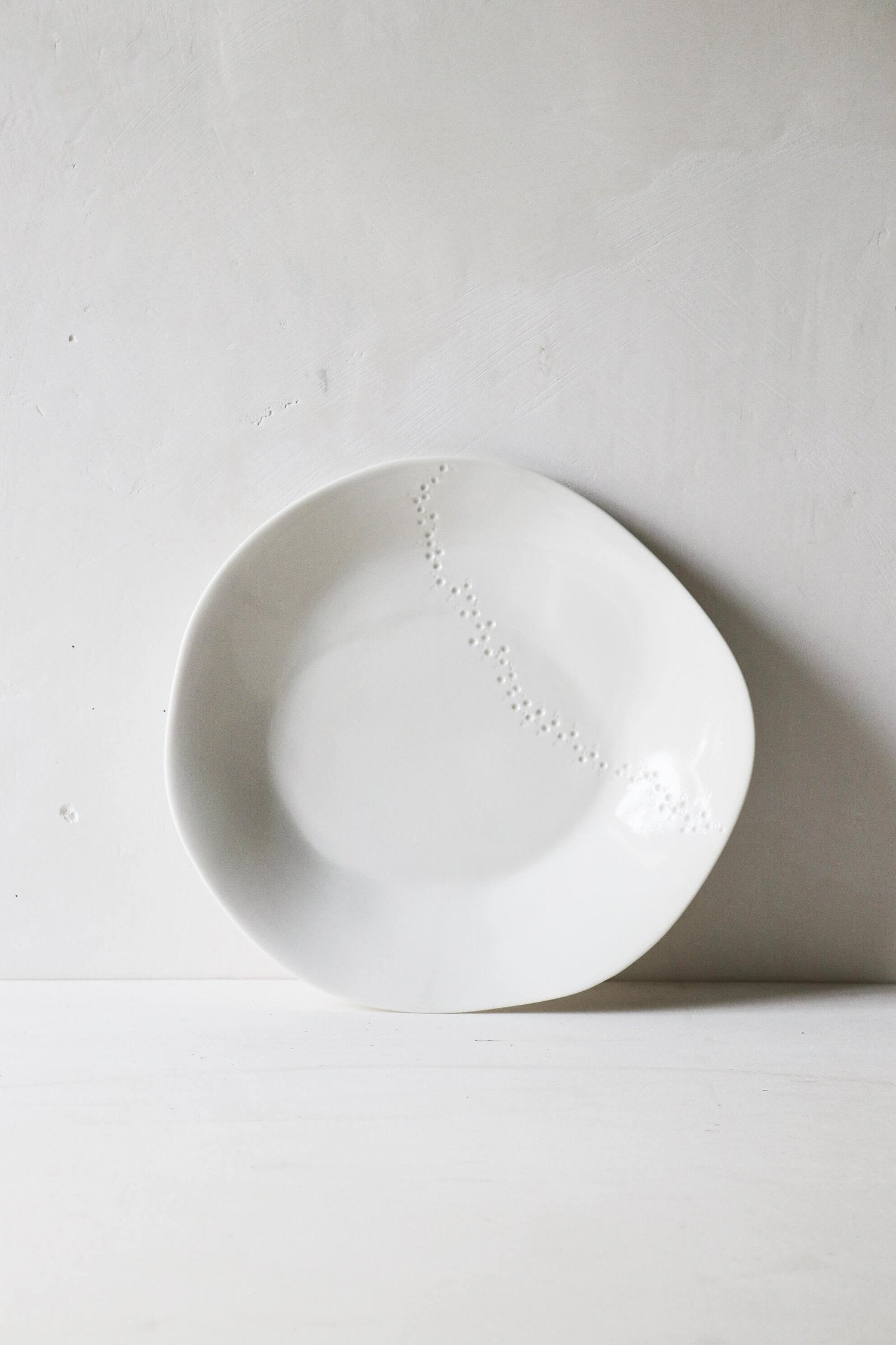 Assiette en porcelaine Point